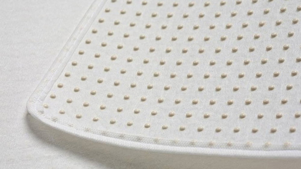 Matrasbeschermer met latex noppen detail