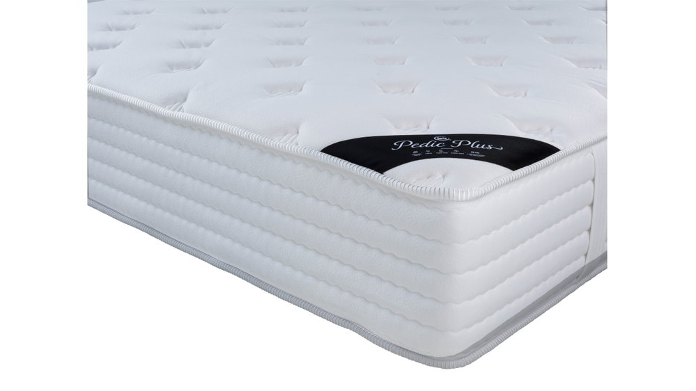 Detail van de rijk doorstikte comfortafwerking van de Serta Pedic Plus