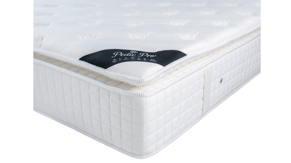 Detailbeeld van de rijke afwerking van de Serta Pedic Pro matras